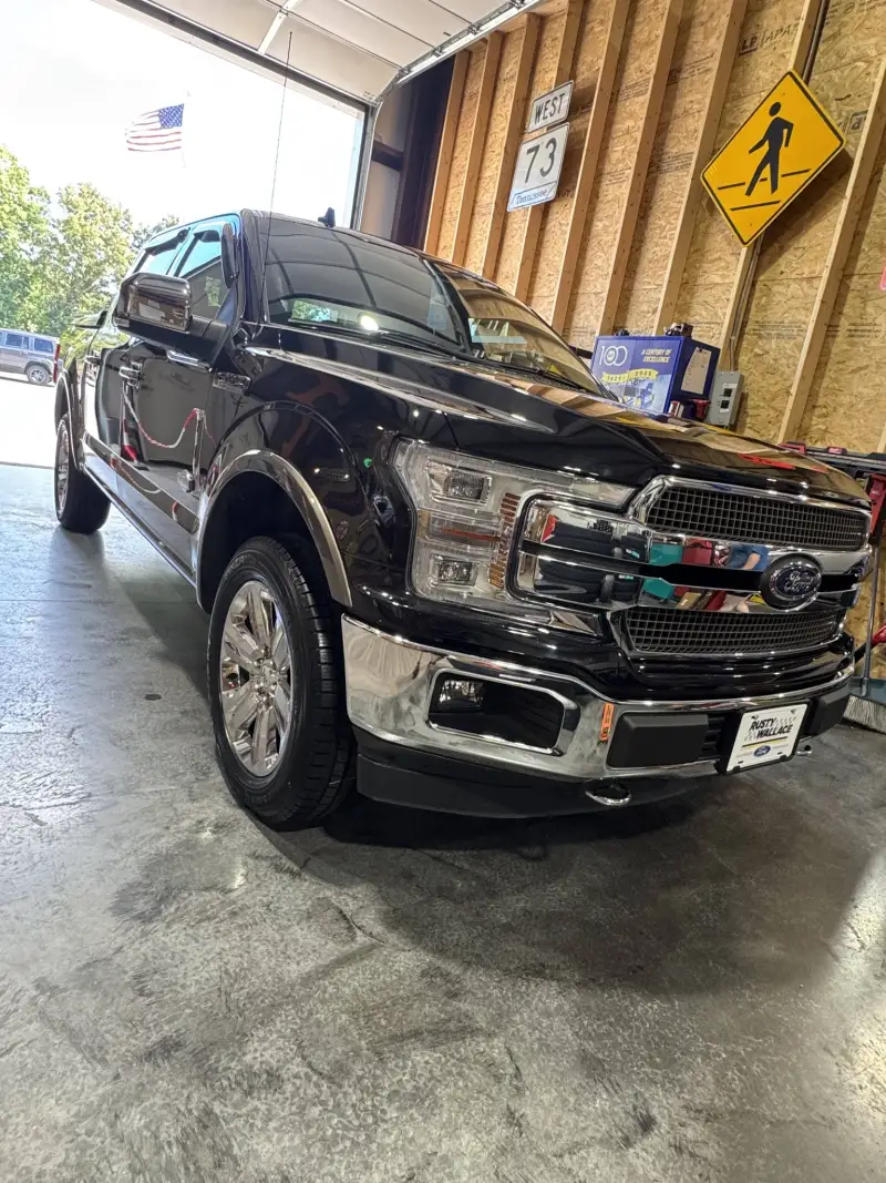 A customer's Ford F-150 parked in the Blessed Beginnings bay